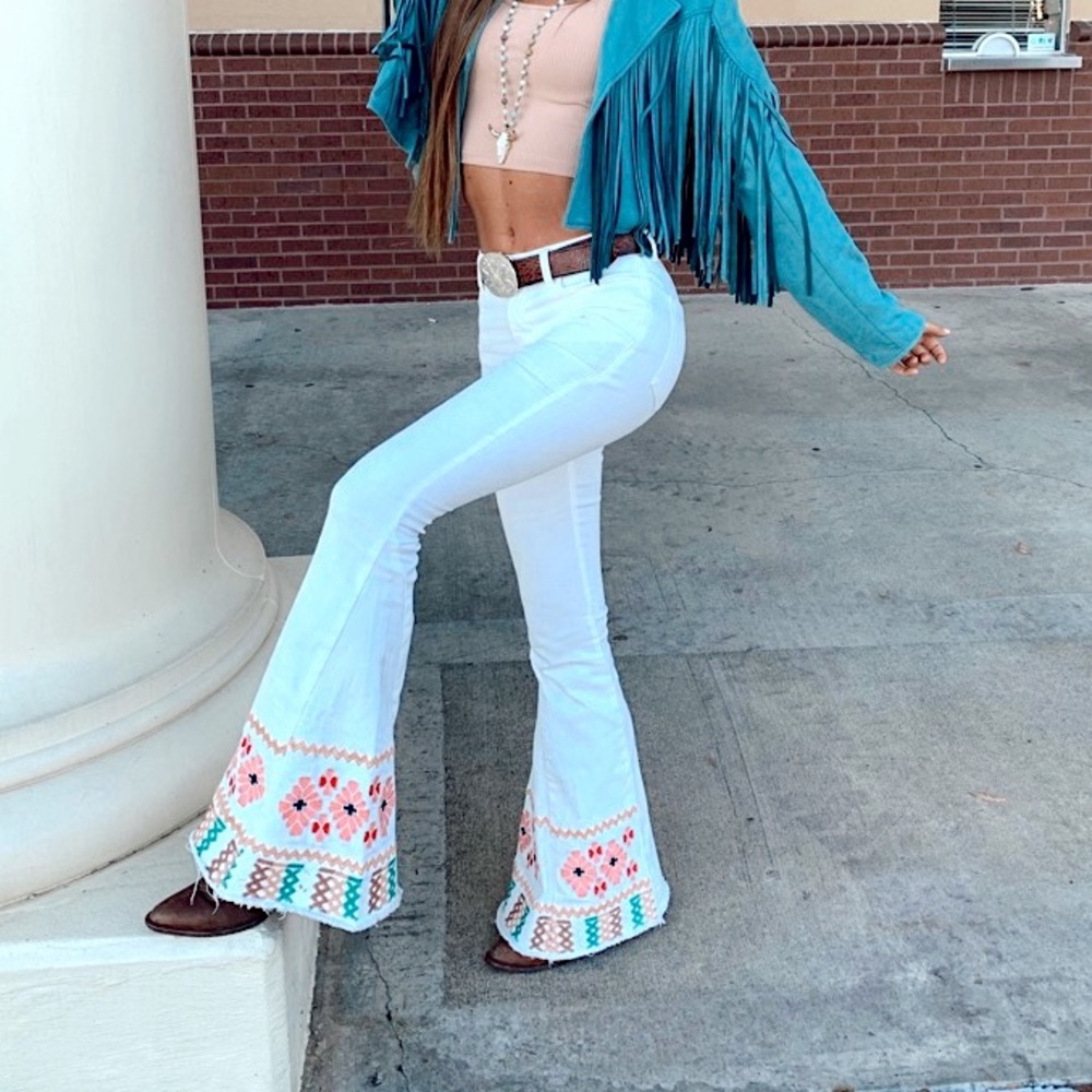 White embroidered flares